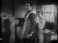 John Wayne de avental